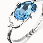 Bangle bracelet with faceted blue crystal
